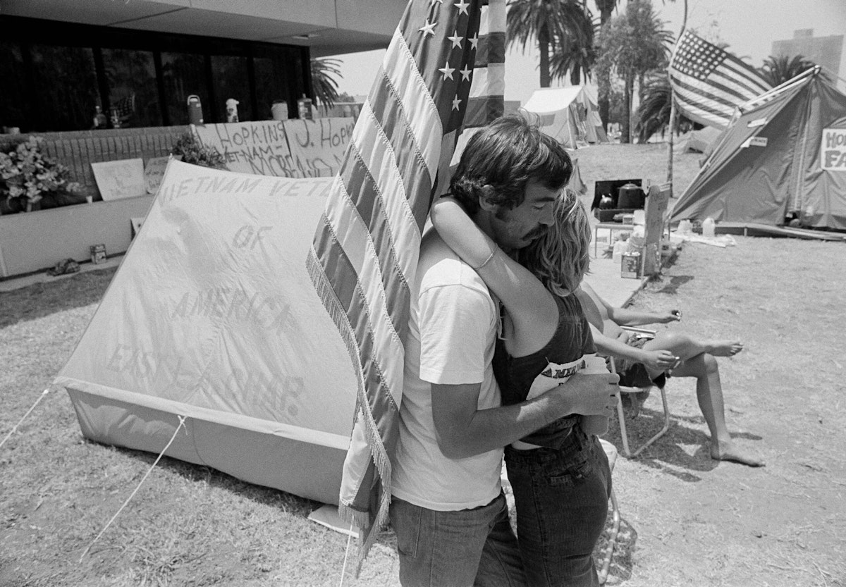 Hunger striker Steve Androff gets a supportive hug from Teri Reagan outside Wadsworth Veterans Hospital in Los Angeles.