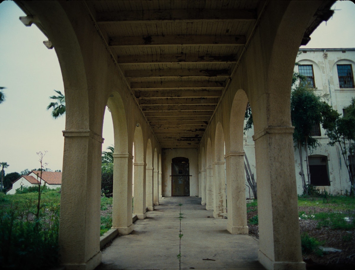 A view through an outdoor covered walkway at the VA.